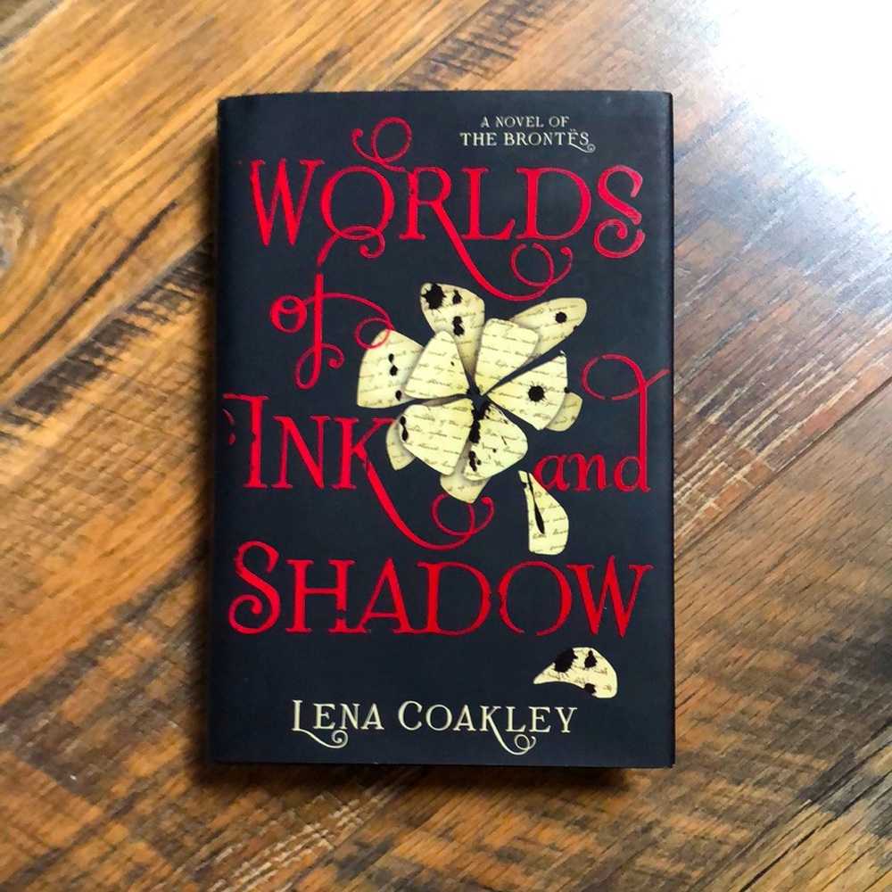 Worlds of Ink and Shadow Hardback Book by Lena Coakley